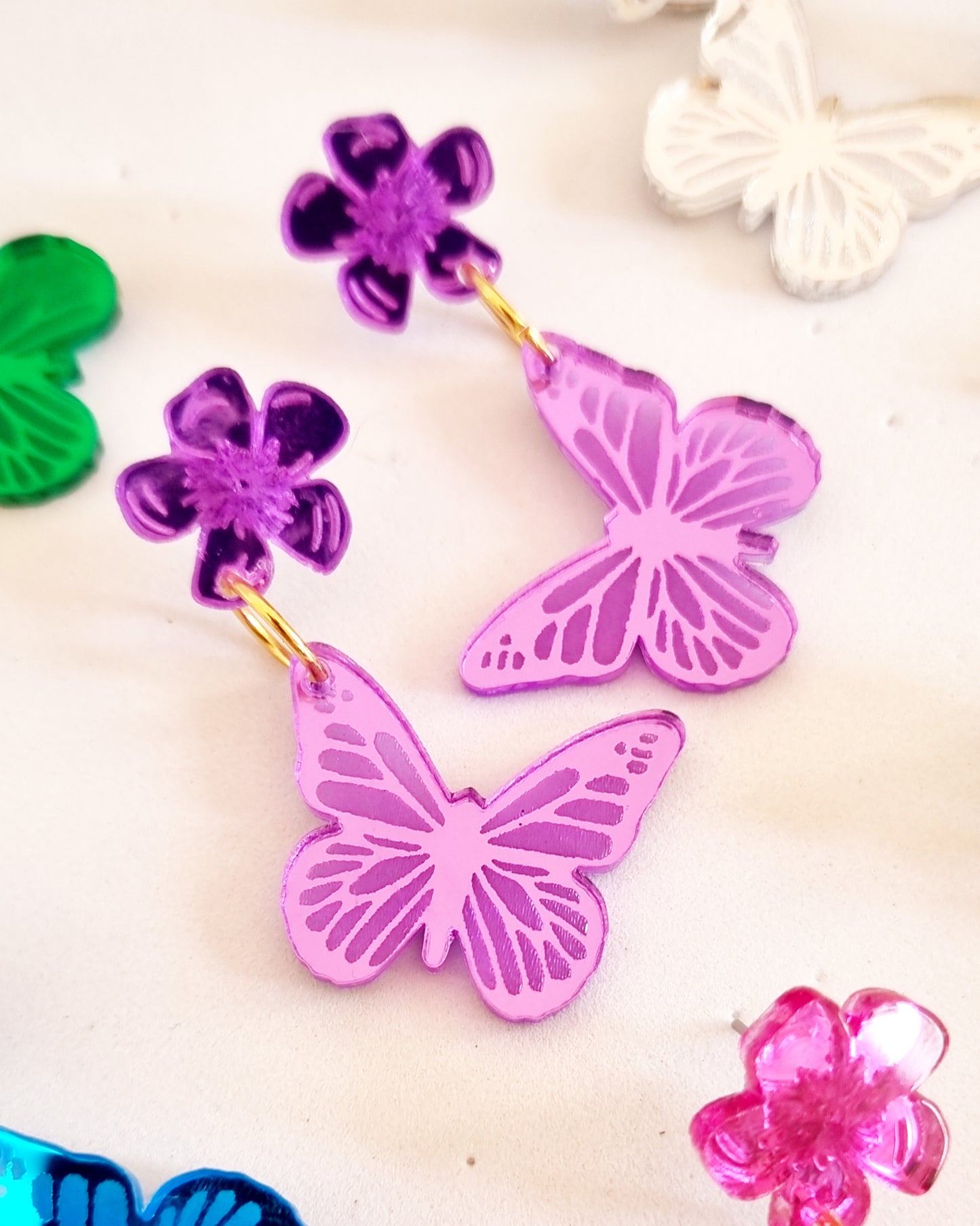 Pendientes mariposas essence colors