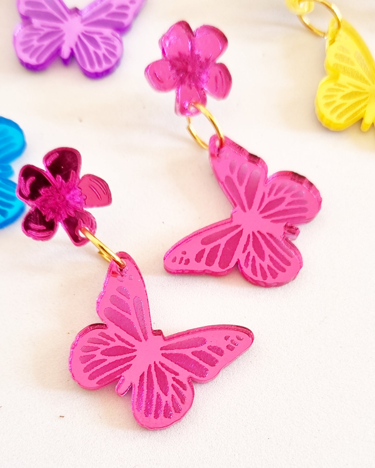 Pendientes mariposas essence colors