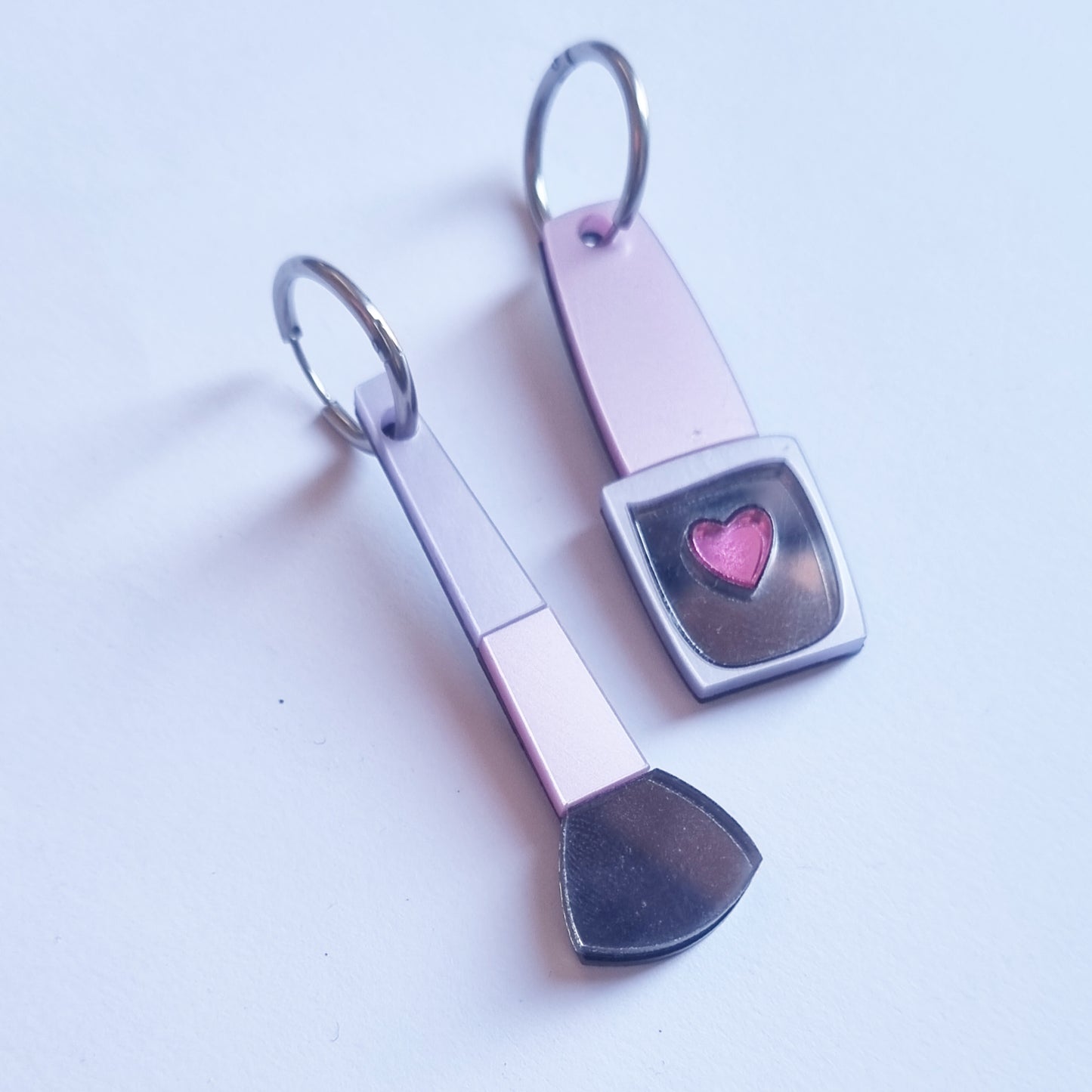 Pendientes pintauñas