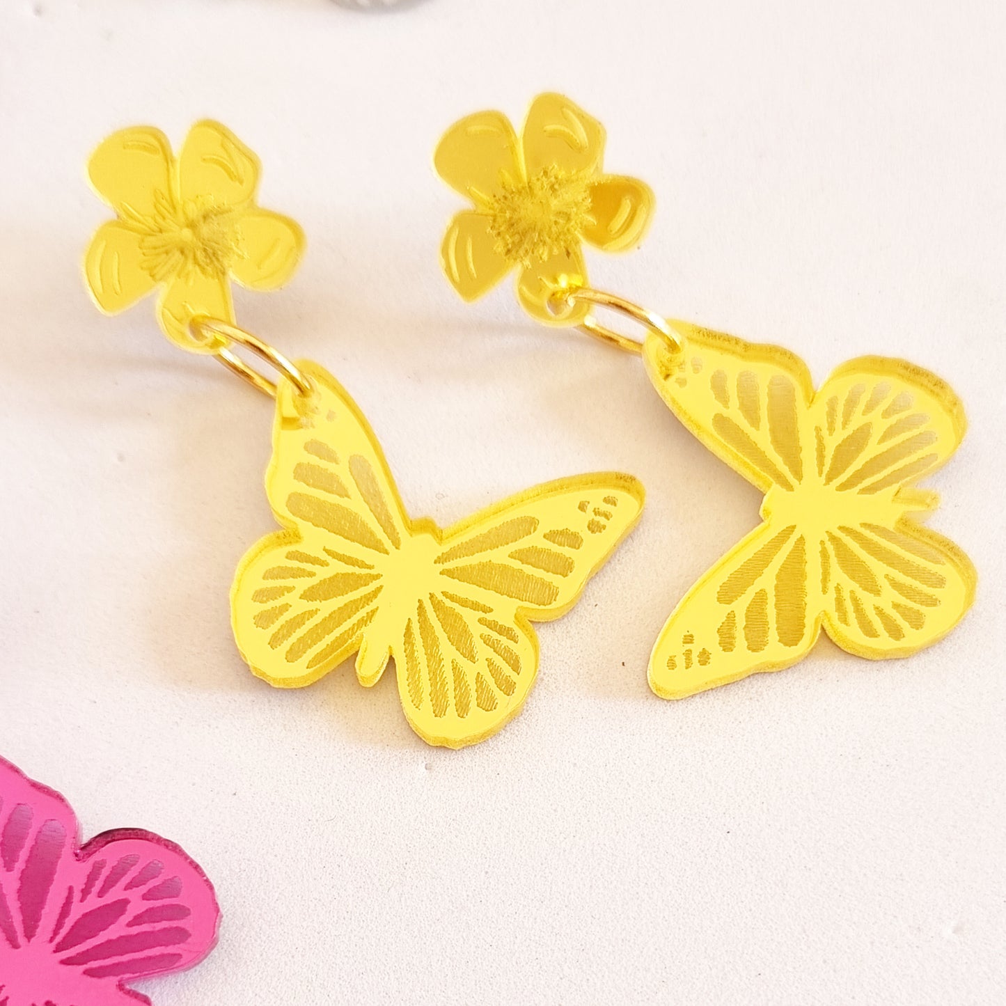 Pendientes mariposas essence colors