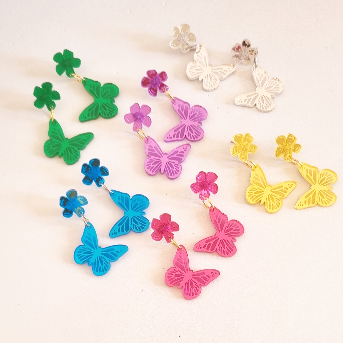 Pendientes mariposas essence colors