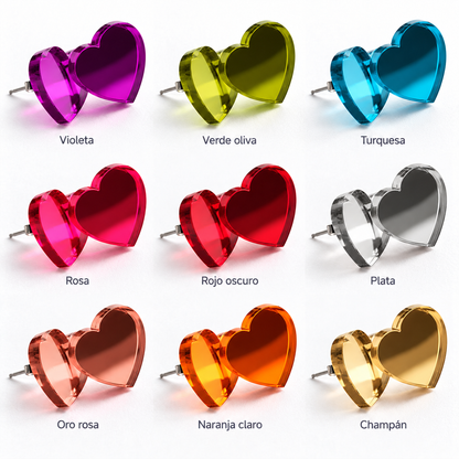 Pendientes de botón en forma de corazón en nueve acabados espejo: violeta, verde oliva, turquesa, rosa, rojo oscuro, plata, oro rosa, naranja claro y champán.