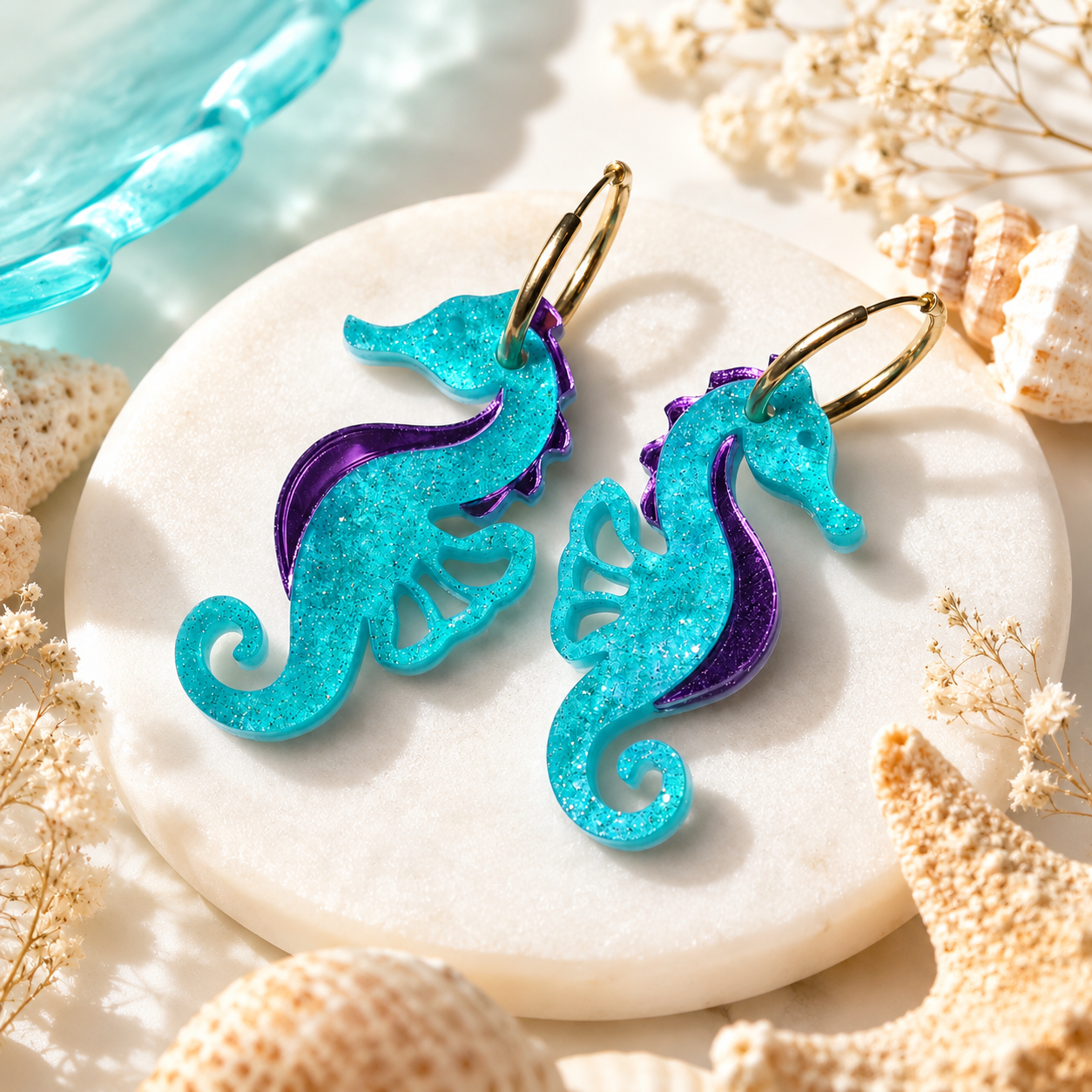 Pendientes caballitos de mar turquesa glim y espejo lila.