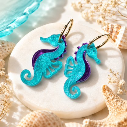 Pendientes caballitos de mar turquesa glim y espejo lila.