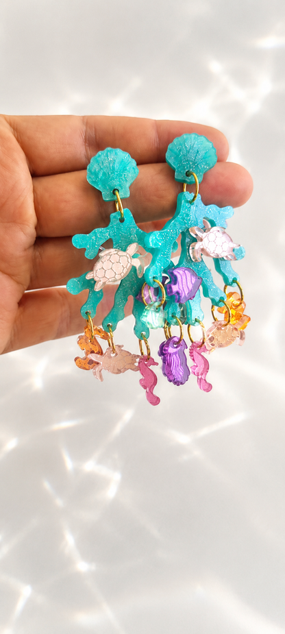 Pendientes arrecifes party