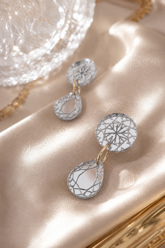 Pendientes diamantes redondos y lagrimas