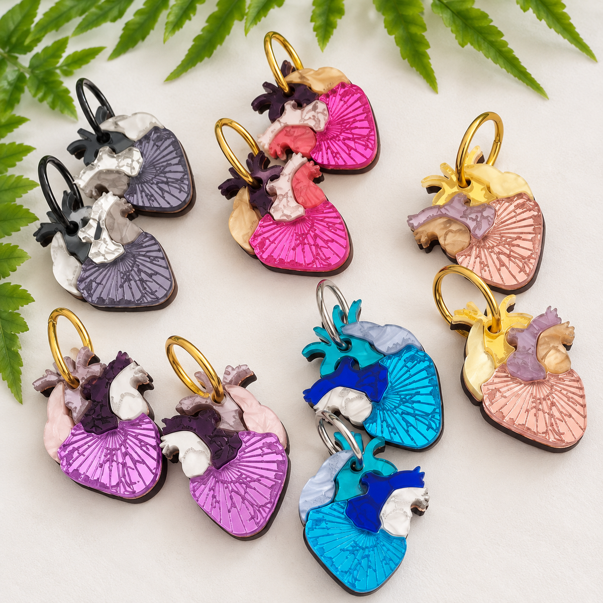Pendientes Corazón Anatómico de metacrilato en gris, fucsia, lila, rosa dorado y azul