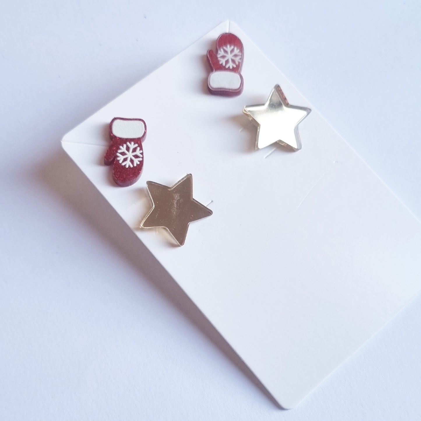 Pendientes estrellas guantes navidad