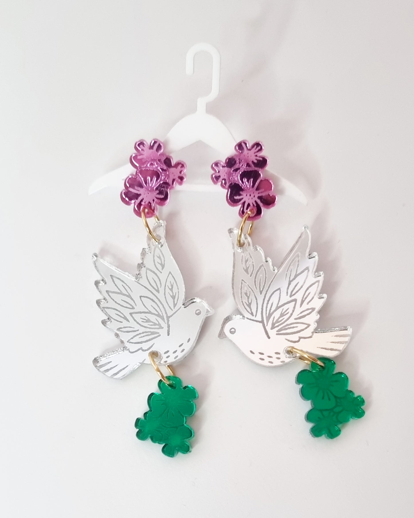 Pendientes palomas vida