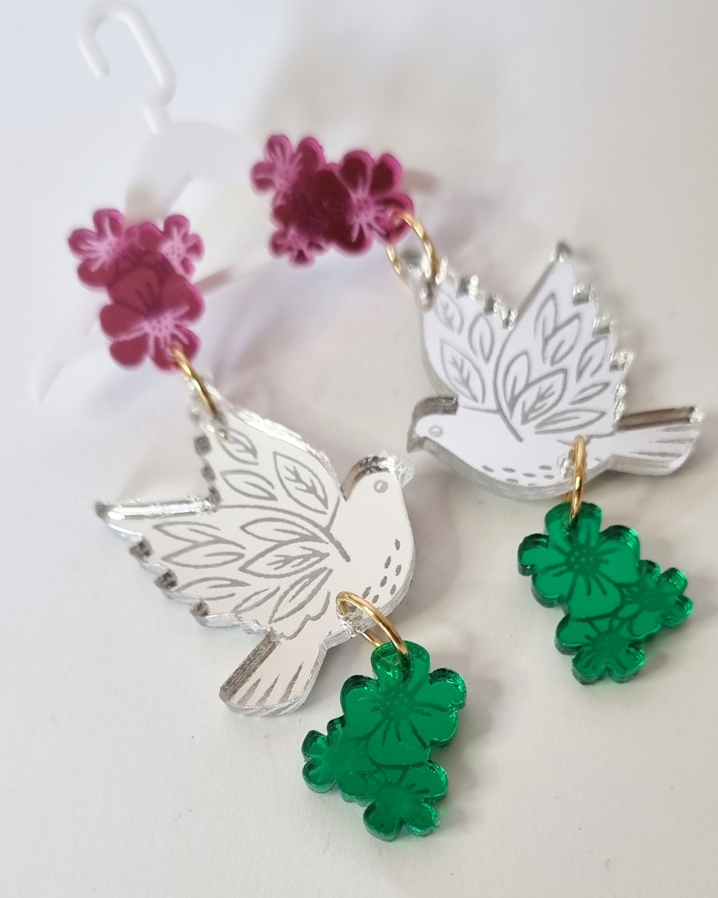 Pendientes palomas vida