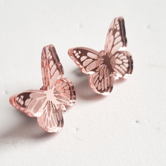 Pendientes mini mariposas espejo